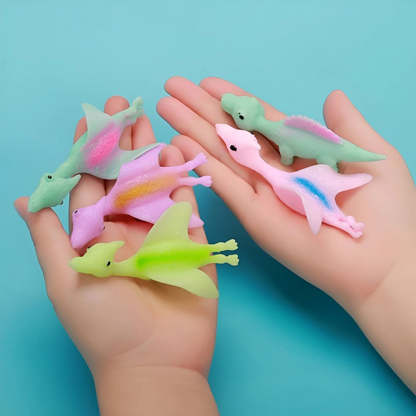 Klebende Gummi Dinos