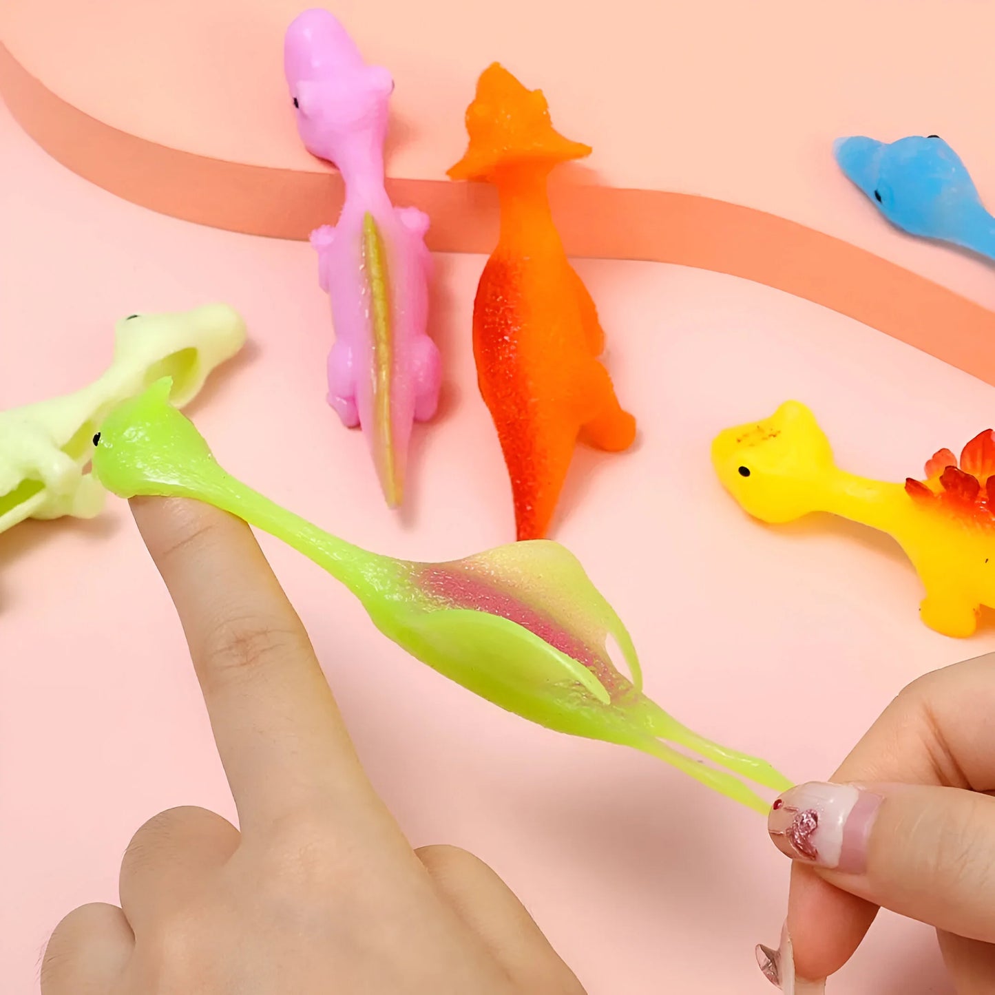 Klebende Gummi Dinos